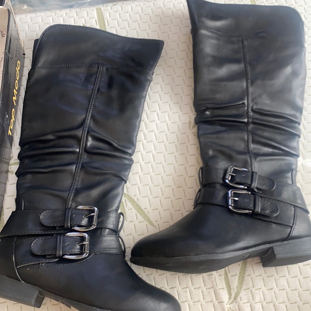 Brand new with box. Size 6, black.